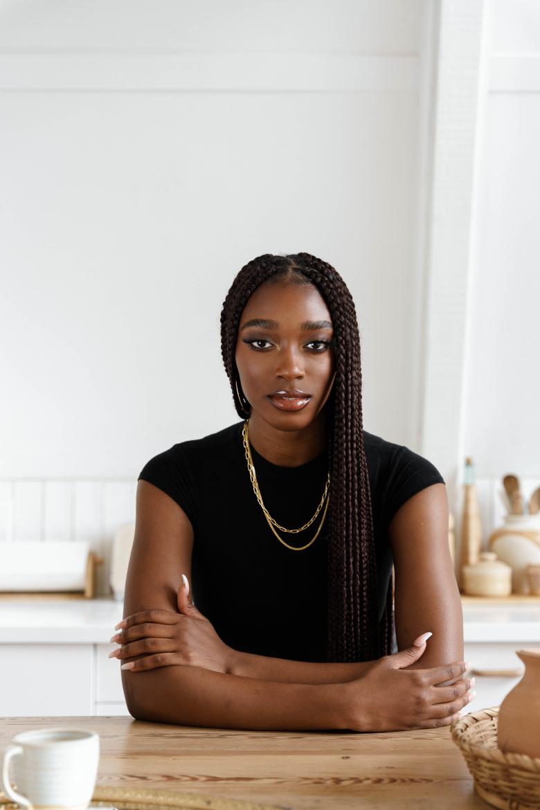 young woman wearing tuscany gold jewelry 