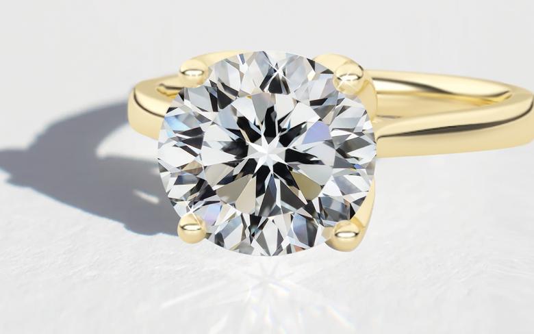 Above Love Star ring display it's star inside of the faceted diamond