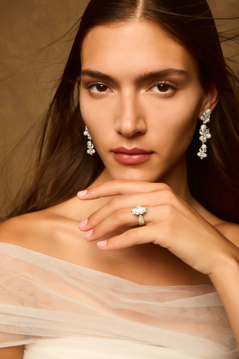 Model wearing Jenny Packham jewelry